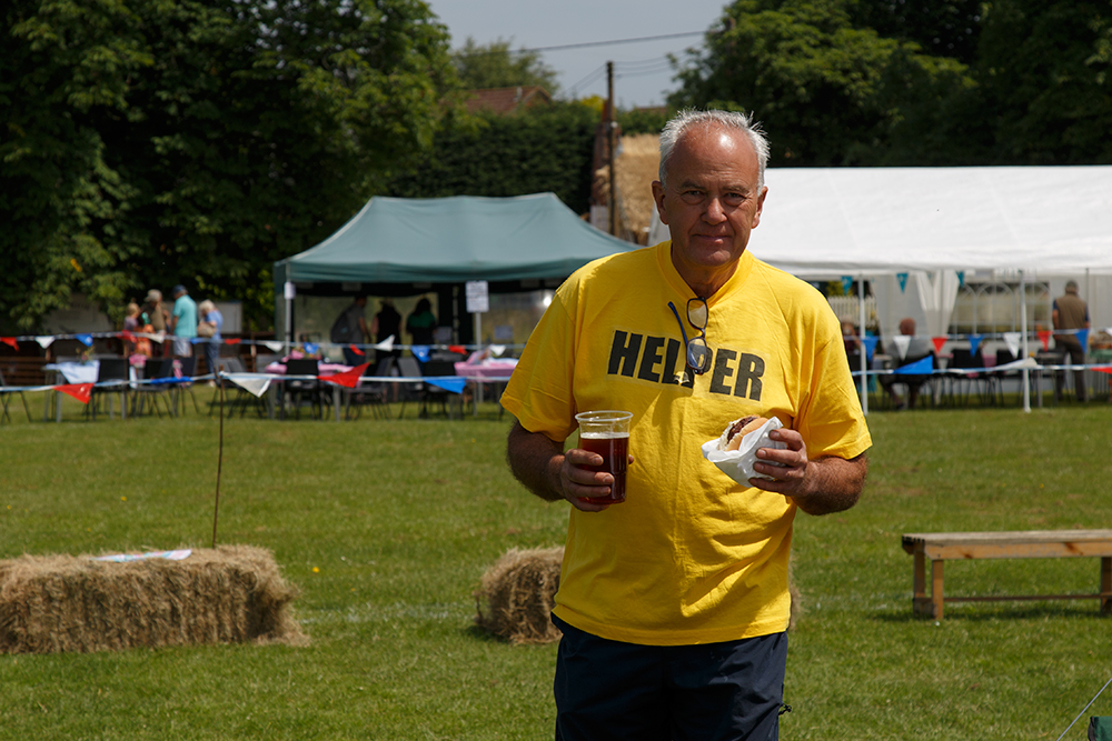 A volunteer helping at the fete